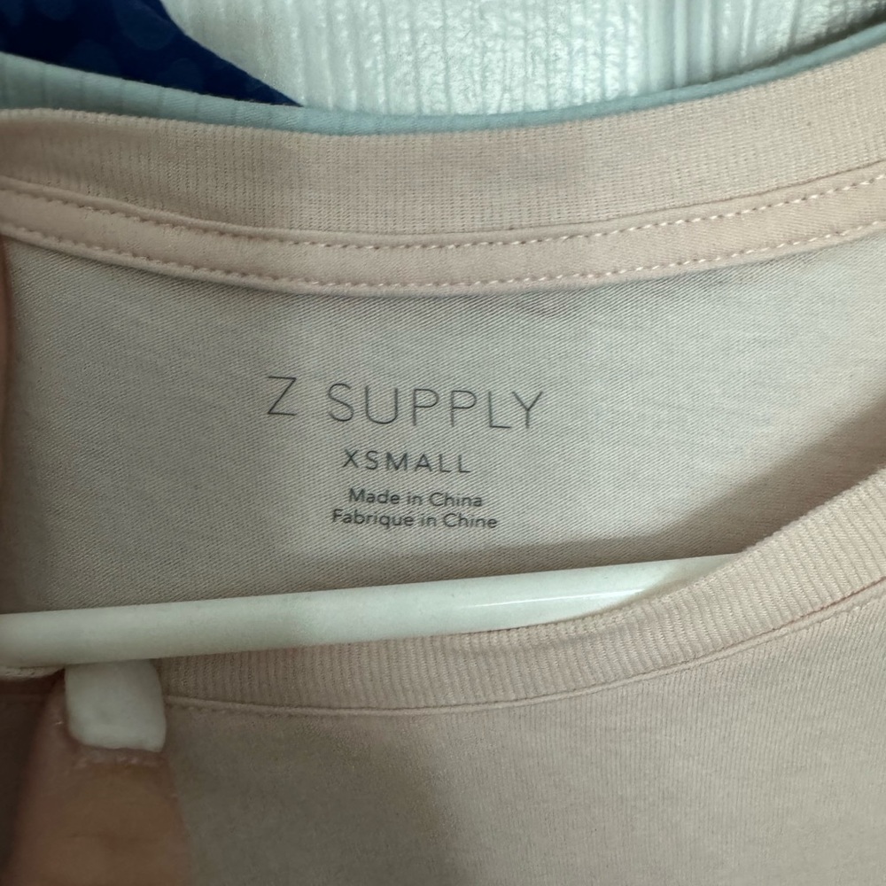 Lighter pink shirt hardly worn new xs
